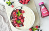 Creamy rice pudding with raspberry fruit topping